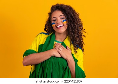woman with hand on heart with sign of gratitude and patriot. September 7. Independence of Brazil.