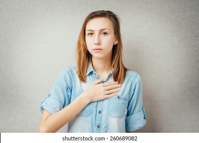 Woman Hand On His Chest. Isolated On Gray Background