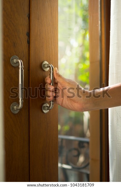 Woman Hand Opening Home Door Stock Photo Edit Now 1043181709