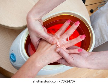 Woman Hand In Paraffin Bath Beauty Treatment