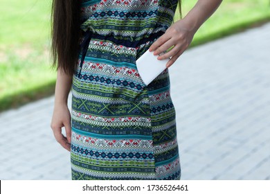 Woman Hand Phone In Pocket In Street