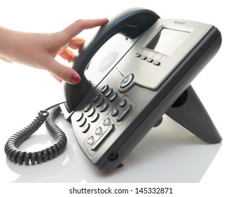 Woman Hand Is Picking Up The Phone