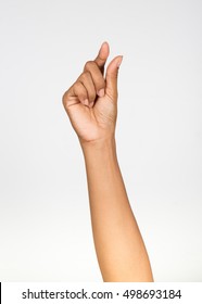 woman hand pinch on a white background.