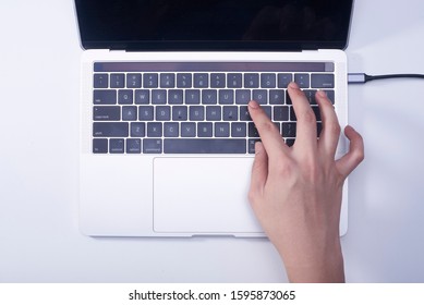 Woman Hand Pressing Keyboard Shortcut On Laptop Keyboard