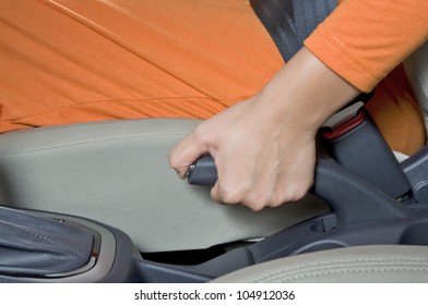 Woman Hand Pull Hand Brake Of A Car