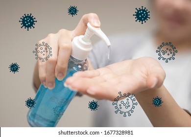 Woman Hand Pump Alcohol Gel To Clean Her Habnd In Order To Kill Germs And Corona Virus