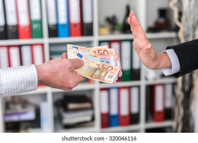 Woman Hand Rejecting An Offer Of Money