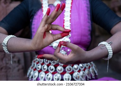 Woman hand showing Hamsasyo hasta or hand gesture, also called mudra meaning Swan beak of indian classic dance Odissi. Also used in other indian classical dances Kuchipudi also dedicate to budha