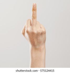Woman hand showing middle finger