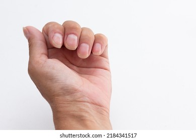 Woman Hand Showing Nails Without Polish On White Background