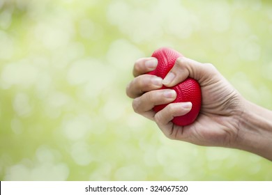 Woman Hand Squeezing A Stress Ball