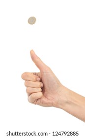 Woman Hand Tossing A Coin On A White Isolated Background