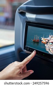 Woman Hand Touching The Lcd Screen At Bus