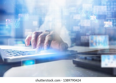 Woman hand typing on laptop with double exposure of immersive digital telecommunication interface. Concept of hi tech, artificial intelligence, cloud computing and programming. Toned image