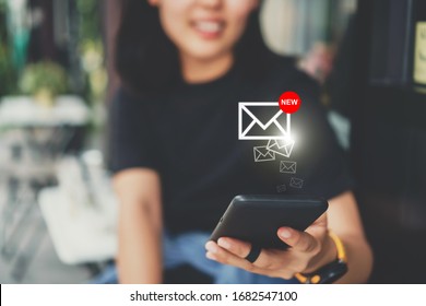 Woman Hand Use Smartphone In Public Area With 1 New Email Alert Sign Icon Pop Up. Communication Business Technology Concept.