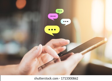 Woman hand using smart phone at coffee shop with email icon flying and line dot abstract. Technology business and freelance concept. Vintage tone filter effect color style. - Shutterstock ID 1713300862