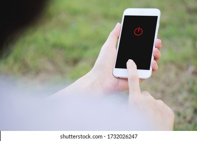 Woman Hand Using Smartphone To Switch Off Or Shut Down Online And Social Connection. Phone Turn Off 