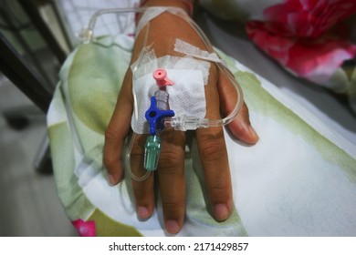 A Woman Hand Were Connected To Insulin Drip Intravenous Diabetes After Very High Blood Sugar In The Hospital Bed. Selected Focus.