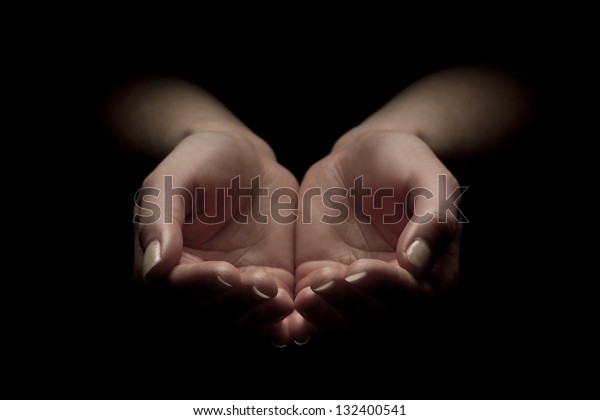 Woman hands begging with outstretched hands. Hands\
forming a cup.