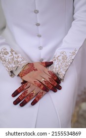 Woman Hands With Black Mehndi Tattoo. Hands Of Bride With Black Henna Tattoos.