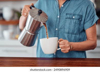 Woman, hands and coffee with moka pot for morning, caffeine or breakfast beverage in mug at home. Closeup of female person pouring latte, cappuccino or espresso for drink, energy or liquid in kitchen - Powered by Shutterstock