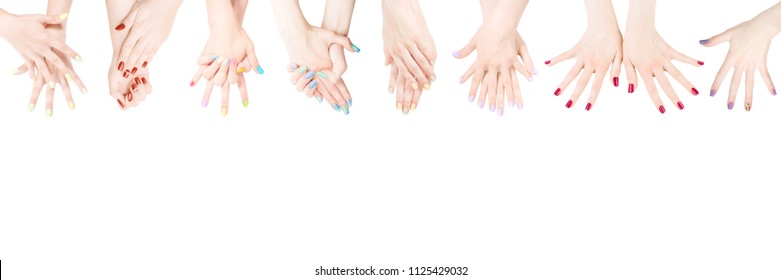 Woman hands with colored nail polish set in the row. Isolated on white
