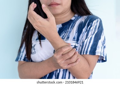 Woman Hands Feeling Pain In Arm With Side Effects After Receiving Vaccination Against COVID-19. Unhappy Woman Showing Arm With Numbness And Pain. Immunization, Inoculation And Coronavirus Pandemic