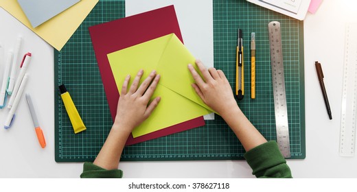 Woman Hands Folding Paper Desk Concept