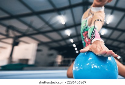 Woman hands, gymnastics and ball for performance, elegant training and dancer in sports arena. Closeup female, rhythmic movement and dancing for creative talent, solo concert and agility in action - Powered by Shutterstock