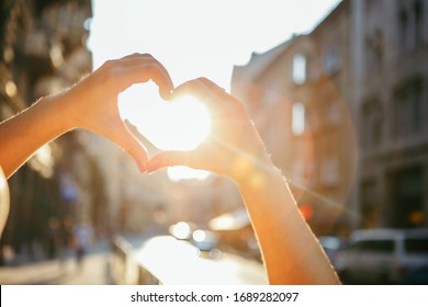 Woman Hands In Heart Love Shape Symbol Sunset