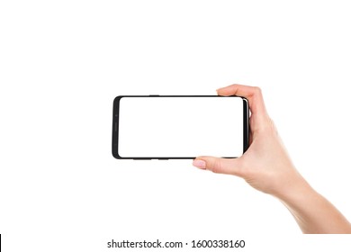 Woman Hands Holding The Black Smartphone Blank Screen With Modern Frameless Design Isolated On White Background