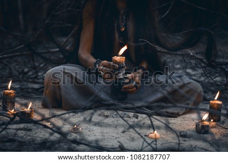 woman hands holding candle close up