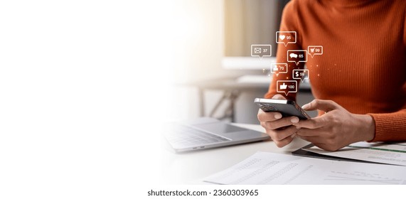 Woman hands holding device. internet digital marketing online community, Social media interactions on mobile phone. concept with notification icons of social media. - Shutterstock ID 2360303965