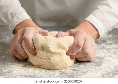 Woman Hands Kneading Whole Wheat Flour Bread Dough, Close Up View