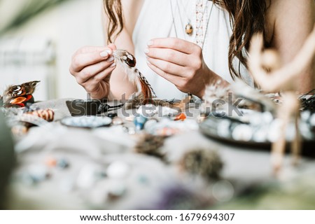 Woman hands making handmade gemstone jewellery, home workshop. Women artisan creates jewellery. Art, hobby, handcraft concept