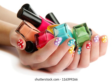 woman hands with nail polishes isolated on white