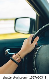 Woman Hands On Steering Wheel Close Up