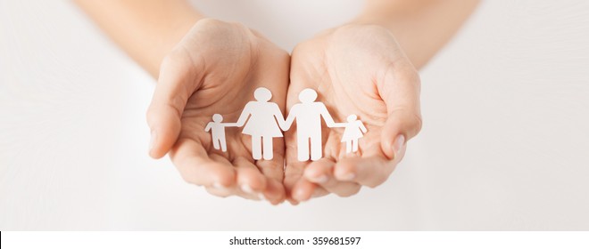 Woman Hands With Paper Man Family