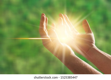 Woman hands praying for blessing from god, blurred nature background, rain, day. Religious human open empty hands with palms up. Gratitude, preacher worship, solitude pray, religion devotion concept