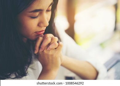 woman hands praying to god with the bible. Woman Pray for god blessing to wishing have a better life. begging for forgiveness and believe in goodness. Christian life crisis prayer to god. - Powered by Shutterstock