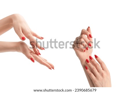 Woman hands with red nails isolated on a white background. Red nail polish. 