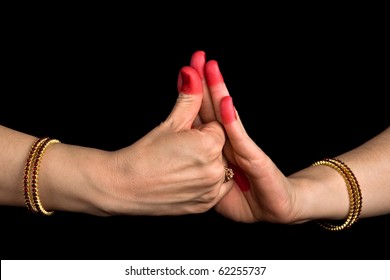 Woman hands showing Shankhu hasta of indian classic dance Bharata Natyam