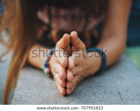 Woman hands together symbolizing prayer and gratitude. Mudra. Yoga concept.