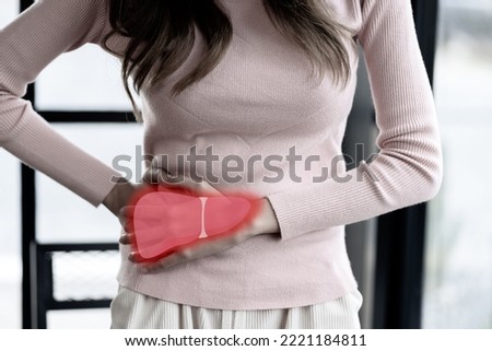 woman hands touching on liver pain organ, asian female with hepatitis vaccination, liver cancer treatment. Healthy feminine concept.