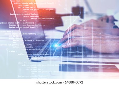 Woman hands using laptop computer in blurred office with double exposure of lines of code. Concept of programming. Toned image - Shutterstock ID 1488843092