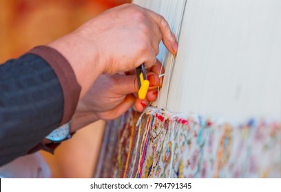 Woman Hands Weaving Carpet