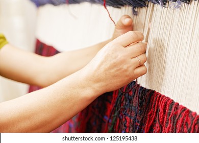 Woman Hands Weaving Carpet Closeup Photo