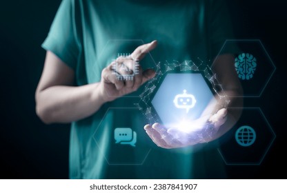 Woman hands working on computer and data theme hologram HUD. Tech concept. Ai hologram with digital human head on dark background. Machine learning, artificial intelligence and conversation assistant.