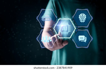 Woman hands working on computer and data theme hologram HUD. Tech concept. Ai hologram with digital human head on dark background. Machine learning, artificial intelligence and conversation assistant.