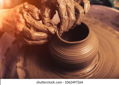 Woman Hands Working On Pottery Wheel.